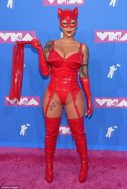 Amber-Rose-flaunts-her-hourglass-figure-in-a-devil-costume-for-MTV-VMAs-red-carpet...-as-star-arrives-in-bodysuit-with-face-mask-and-whip-1.jpg