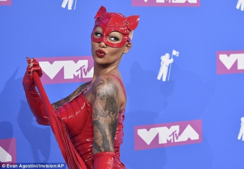 Amber-Rose-flaunts-her-hourglass-figure-in-a-devil-costume-for-MTV-VMAs-red-carpet...-as-star-arrives-in-bodysuit-with-face-mask-and-whip-10.jpg