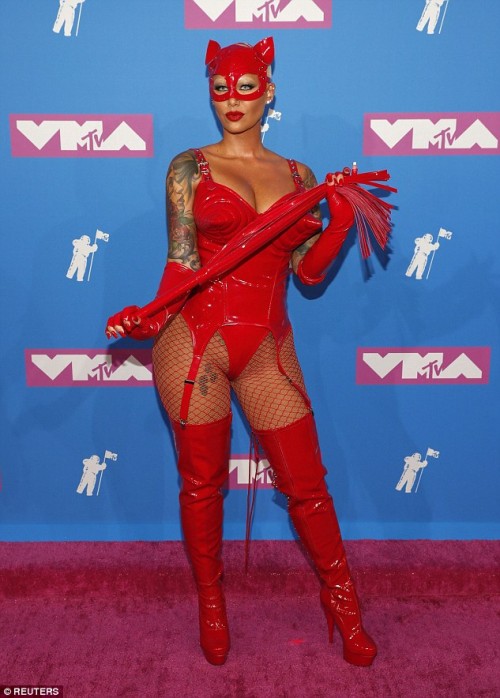 Amber-Rose-flaunts-her-hourglass-figure-in-a-devil-costume-for-MTV-VMAs-red-carpet...-as-star-arrives-in-bodysuit-with-face-mask-and-whip-4.jpg