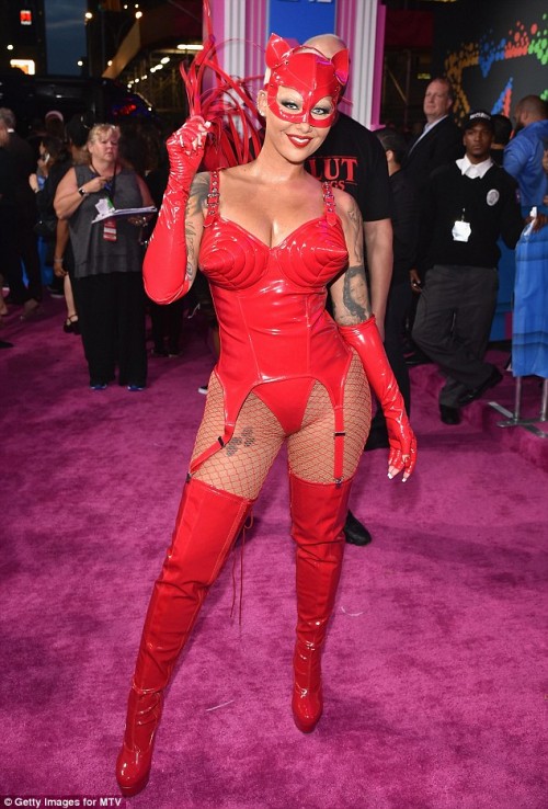 Amber-Rose-flaunts-her-hourglass-figure-in-a-devil-costume-for-MTV-VMAs-red-carpet...-as-star-arrives-in-bodysuit-with-face-mask-and-whip-7.jpg