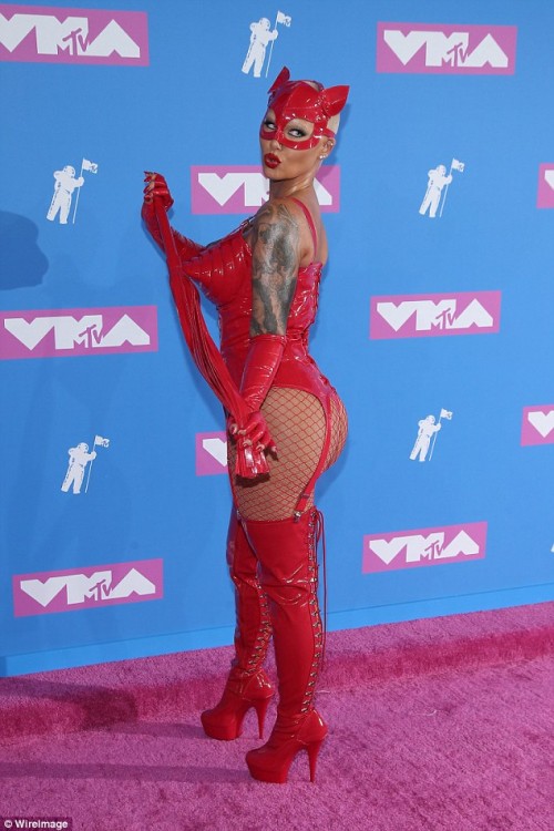 Amber-Rose-flaunts-her-hourglass-figure-in-a-devil-costume-for-MTV-VMAs-red-carpet...-as-star-arrives-in-bodysuit-with-face-mask-and-whip-9.jpg