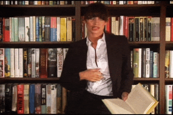 Sophie-Howard-Stripping-in-Library-gifs-1.gif